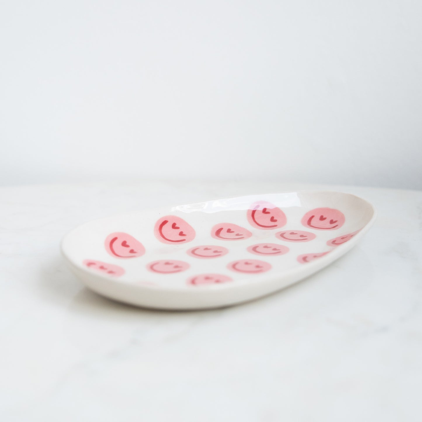 Schaaltje met roze smileys