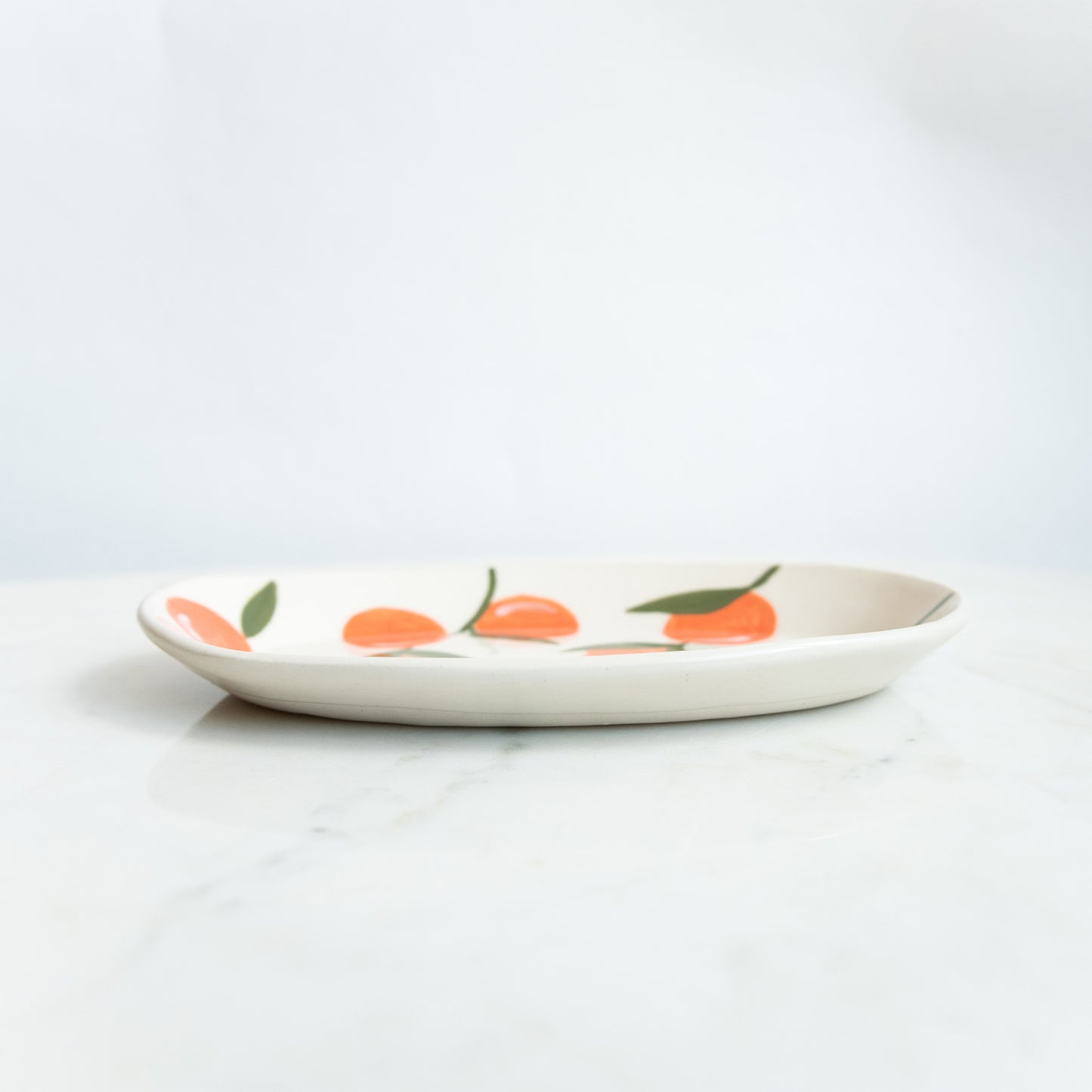 Wit schaaltje sinaasappels