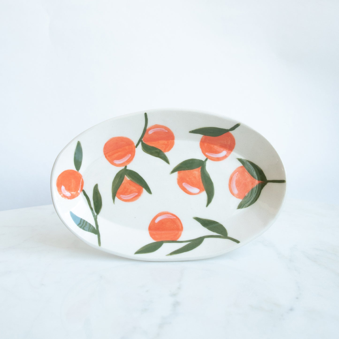 Wit schaaltje sinaasappels